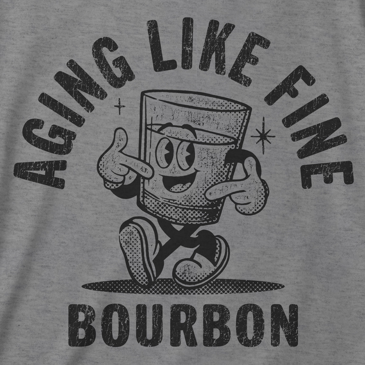 Gray t-shirt with black distressed graphic "Aging Like Fine Bourbon" on a gray background