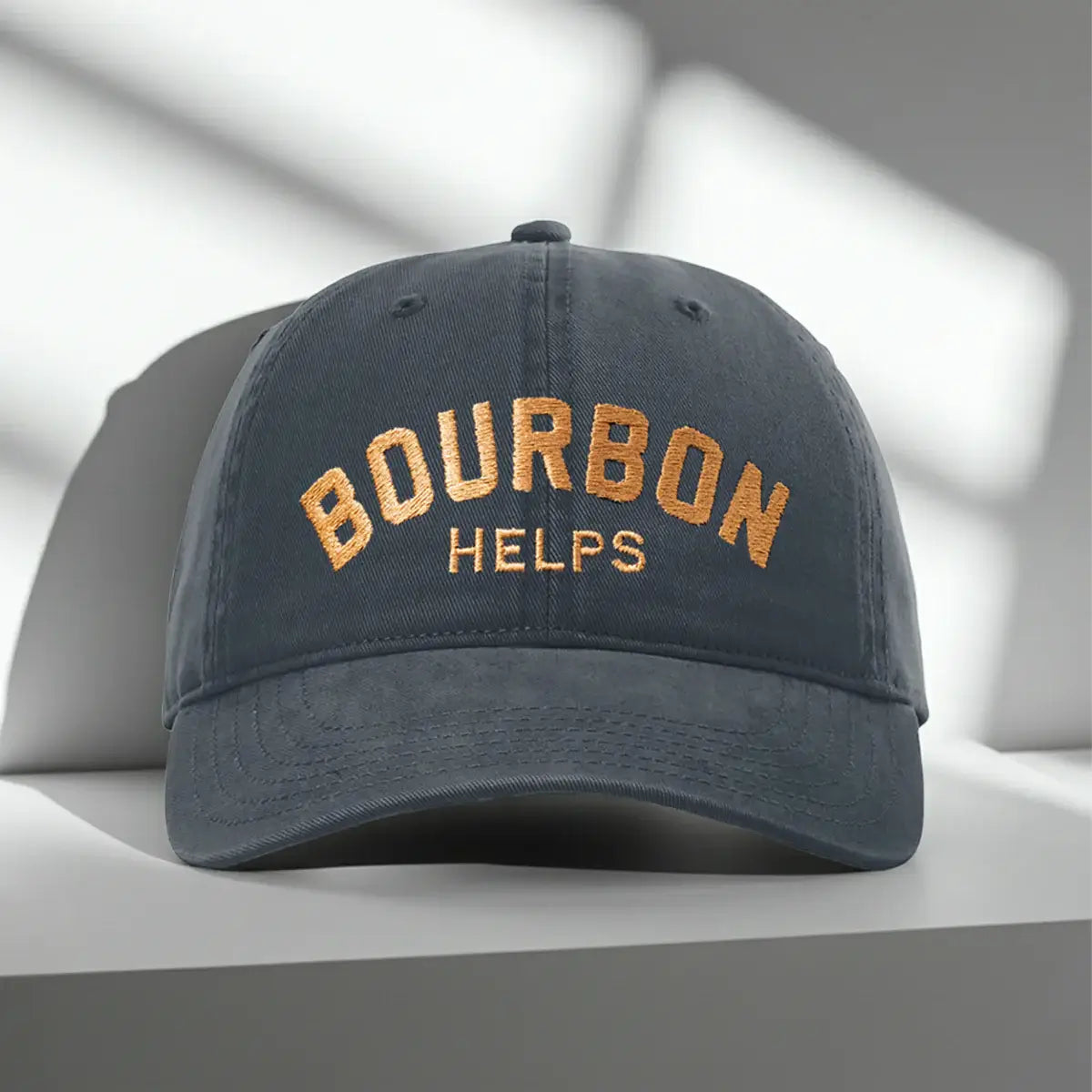 Bourbon Helps Dad Hat - Navy Blue with embroidered text reading 'Bourbon Helps' for stylish comfort.