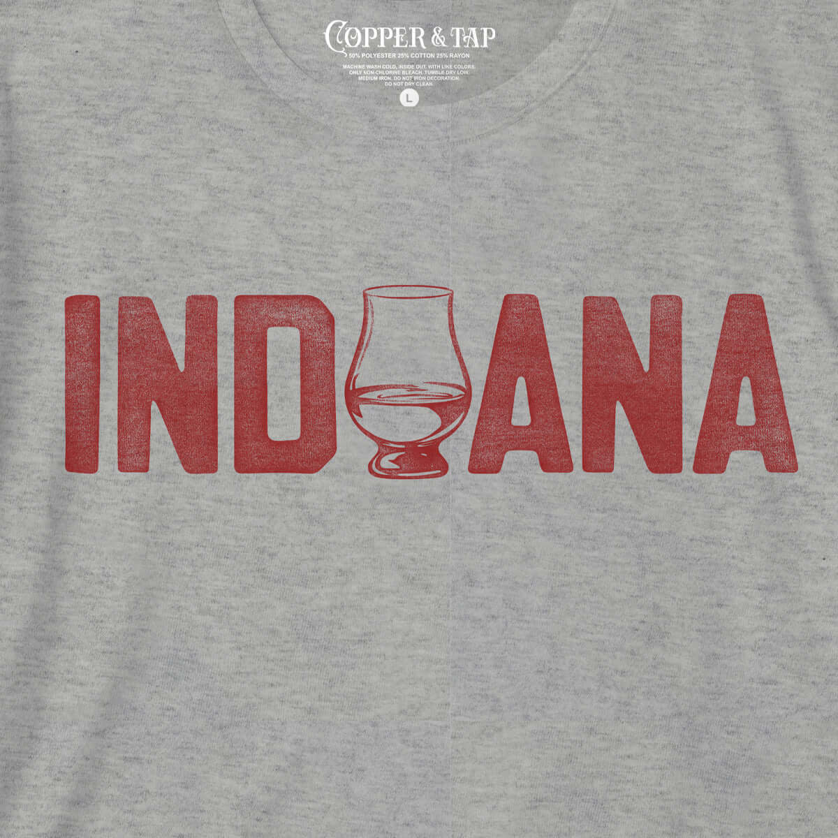 closeup of indiana bourbon t-shirt with a whiskey glass