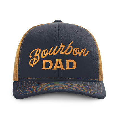 Bourbon Dad Trucker Hat in navy and caramel with bold embroidery