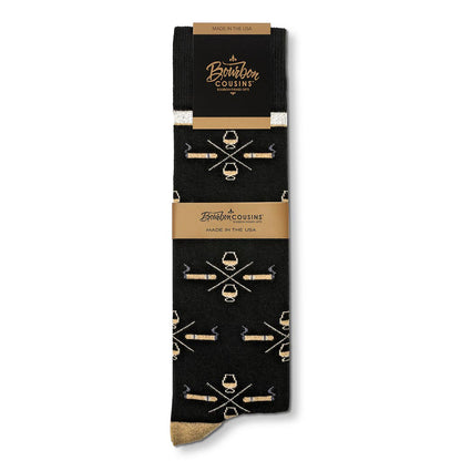 Bourbon+Cigar Socks in black featuring cigars and whiskey glass design by Bourbon Cousins™, made in the USA.