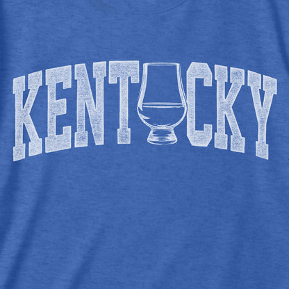Kentucky whiskey tee featuring distressed graphic of whiskey glass on blue fabric, perfect for showing state pride.