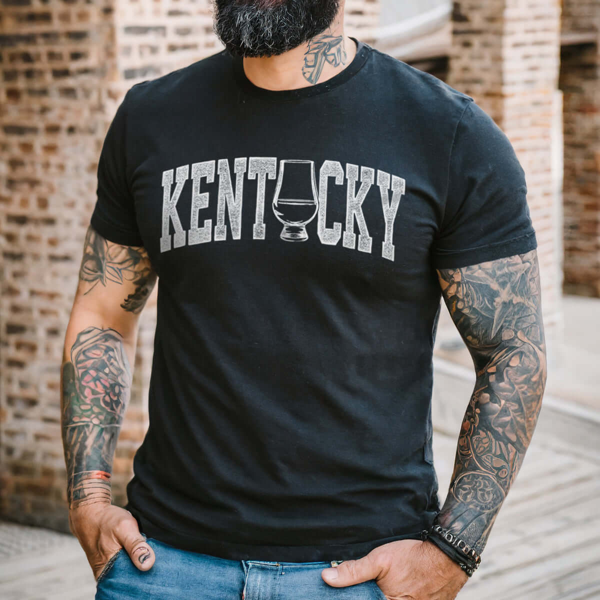 model wearing a black Kentucky Bourbon T-Shirt with a whiskey glass