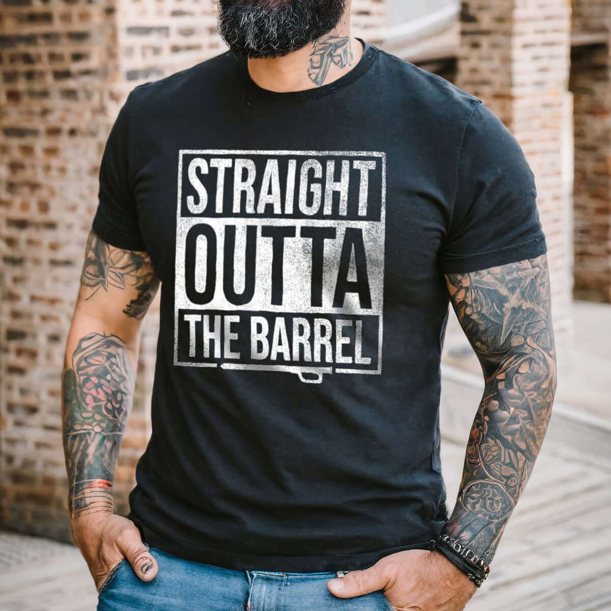 Straight Outta The Barrel Bourbon shirt, tri-blend distressed print, worn by a tattooed man outdoors.