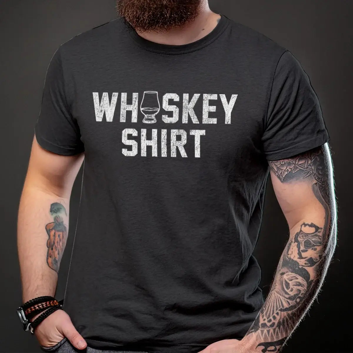 Person wearing a black t-shirt with 'WHISKEY SHIRT' and glass graphic print
