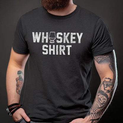 Person wearing a black t-shirt with 'WHISKEY SHIRT' and glass graphic print
