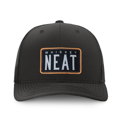 NEAT Whiskey Hat - Black featuring a bold patch with 'WHISKEY NEAT' on a Richardson 112 hat.