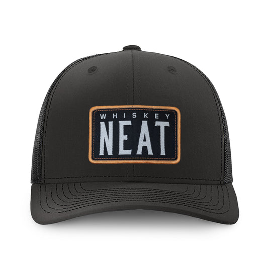 NEAT Whiskey Hat - Black featuring a bold patch with 'WHISKEY NEAT' on a Richardson 112 hat.