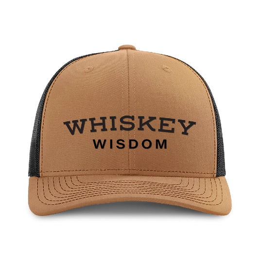 Whiskey Wisdom silicone patch on a caramel and black Richardson 112 trucker hat.